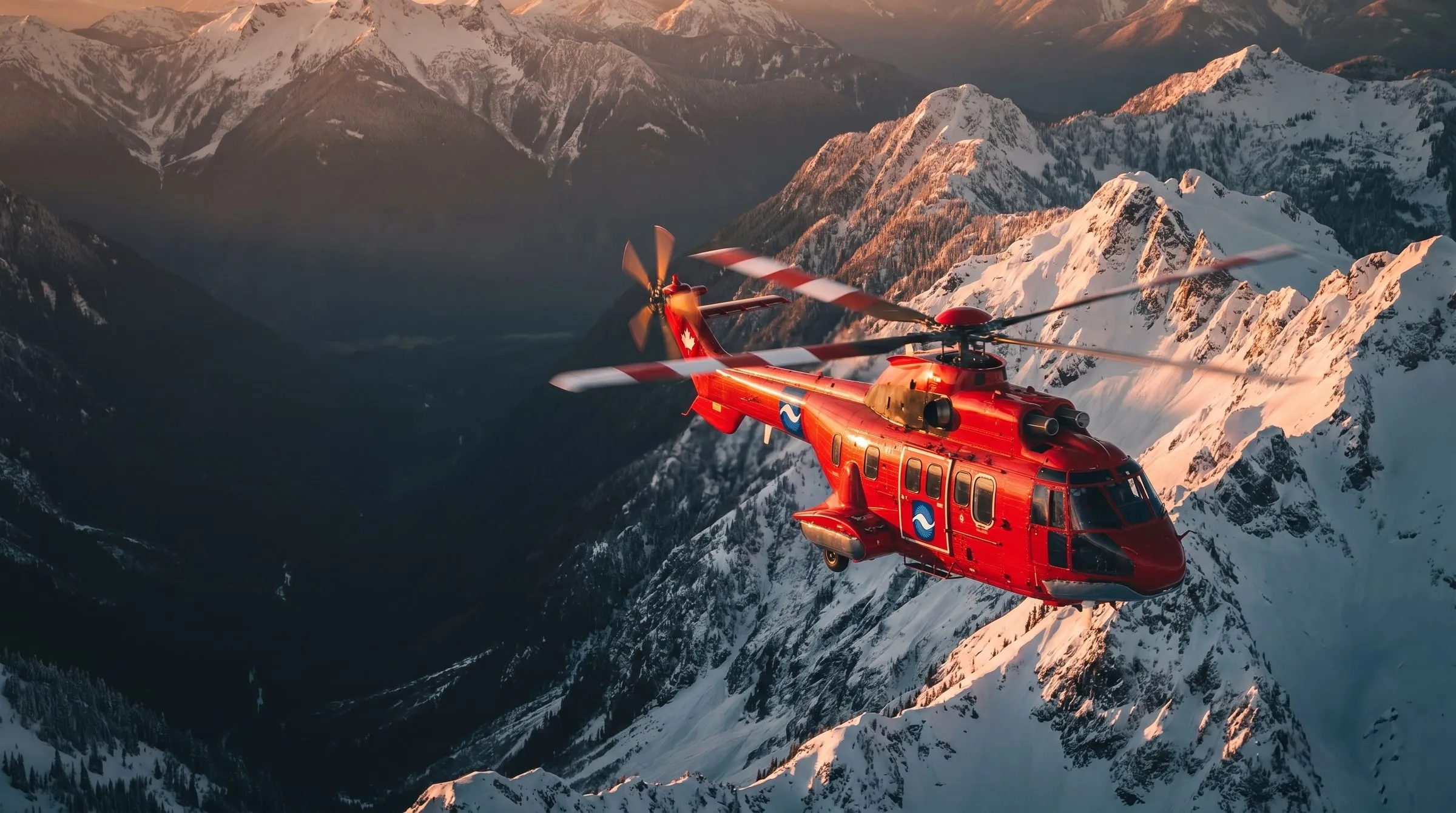 A red Coldstream Super Puma helicopter banking through snow-covered mountain peaks at sunrise